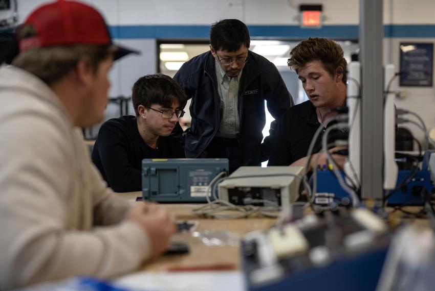 Texas State Technical College Wind Energy Technology instructor James Chung, center, helps Steven Vasquez, left, and Shayne Howard, right, troubleshoot during a lab on logic gates Tuesday, March 5, 2024 in Sweetwater.