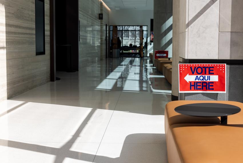 A 'Vote Here' sign is located inside of the Travis County Civil and Family Courts Facility on Mar. 1, 2024. These signs guide voters into the room where they can cast ballots.