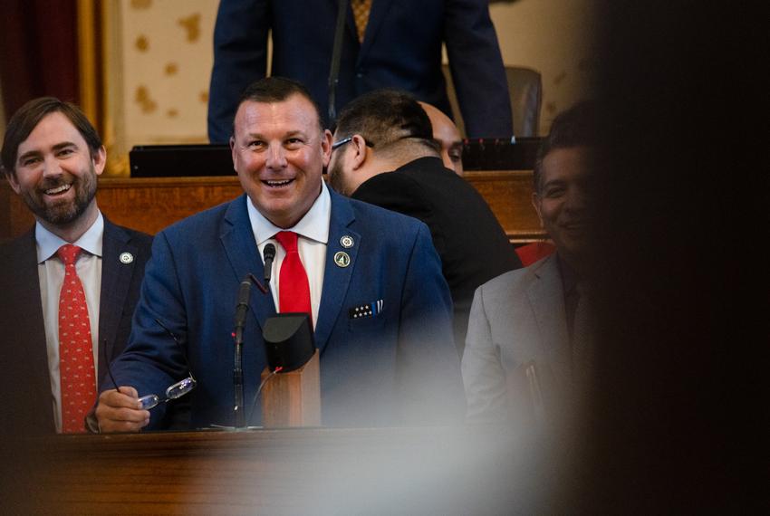 State Rep. Frederick Frazier, R-McKinney, yields for a round of hazing questions as his colleagues gather to support his first House bill during session on the House floor at the state Capitol in Austin on April 25, 2023. 