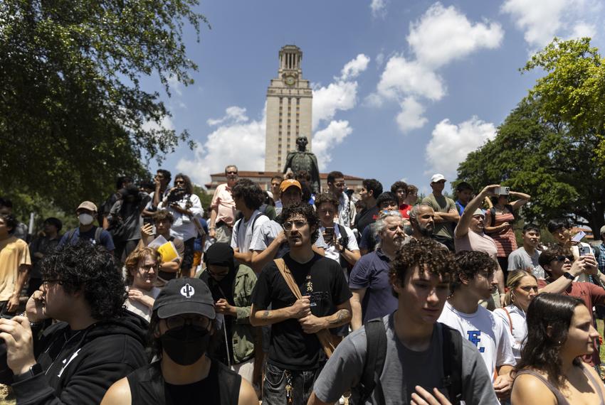 Pro-Palestinian supporters chant as law enforcement begins to remove demonstrators from an encampment set up in support of Palestine on UT campus Monday, April 29, 2024, in Austin.
