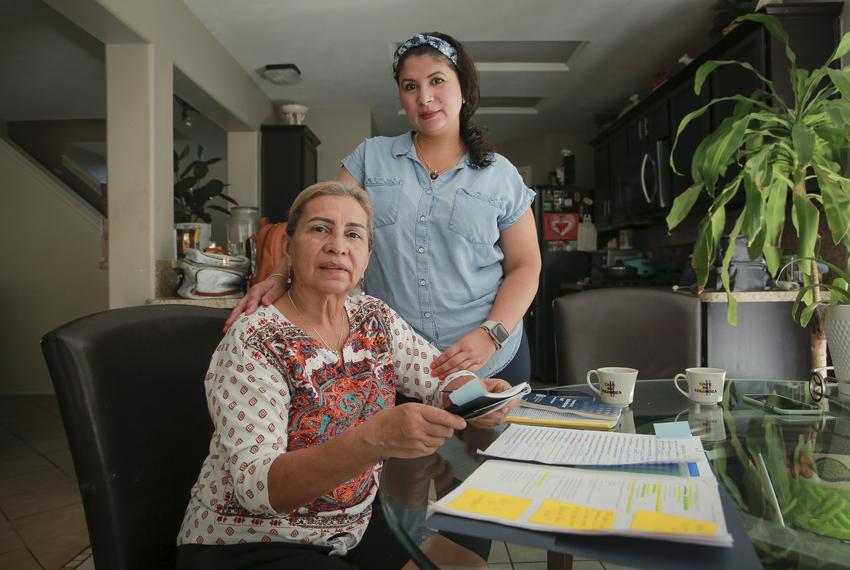 Carmen Ramirez and her daughter, Jessica Mejia in their Baytown, Texas home on Thursday, August 24, 2023. Ramirez and Mejia, originally from Colombia, are pursuing US citizenship and preparing to take the naturalization test together.