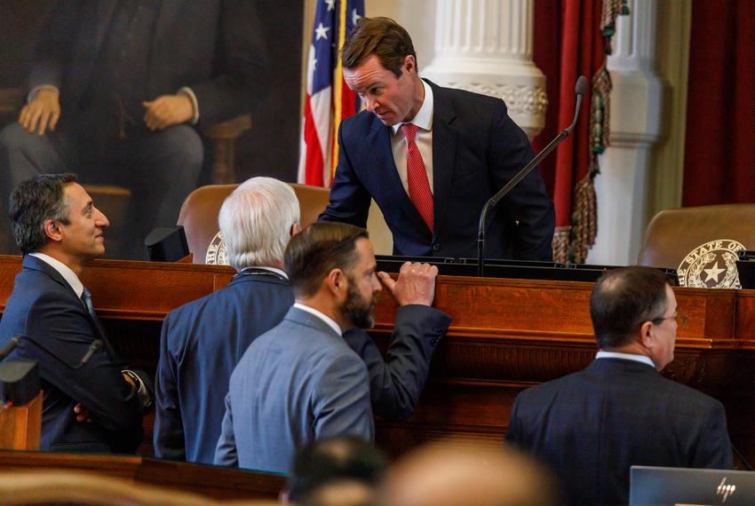 House Speaker Dade Phelan speaks with other represenatives during a special legislative session at the state capitol in Austin, Texas, on Nov. 17, 2023.