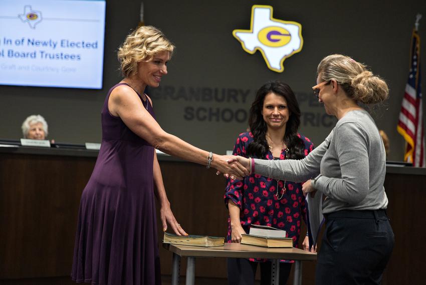 Melanie Graft and Courtney Gore are sworn into the Granbury ISD Board of Trustees at the GISD Administration Building on Nov. 15, 2021.