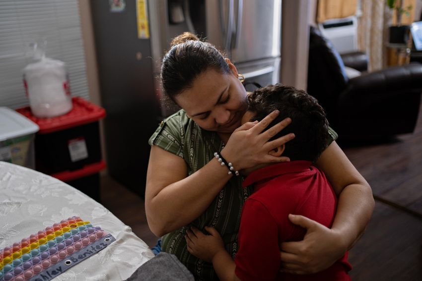 Deysy Canales kisses her 4-year-old son in the kitchen of their home. Since she moved to Cloverleaf, Canales says she is often sick, but she is grateful that her three kids remain in good health. 

Deysy Canales besa a su hijo de 4 años en la cocina de su casa. Desde que se mudó a Cloverleaf, Canales dice que se enferma con frecuencia, pero está agradecida de que sus tres hijos sigan gozando de buena salud.


On January 23, 2024, Deysy Canales, 32, kisses her son in the kitchen of their home in Cloverleaf, Texas.