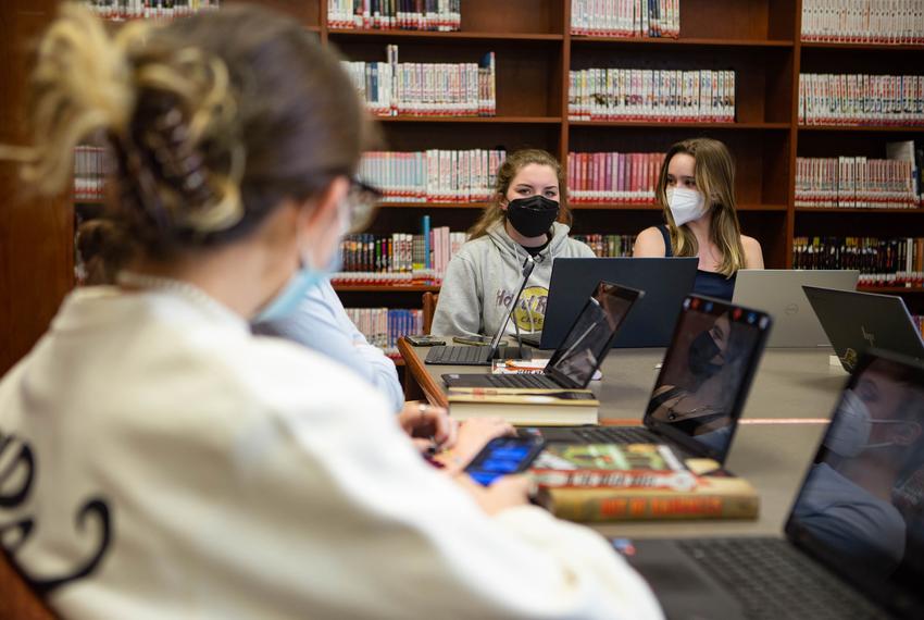 Alyssa Hoy listens to another club member during the meeting in Vandegrift High Scool's library on Wednesday, Mar. 2, 2022. They discussed the banned book "Out of Darkness" by Ashley Hope Pérez and what they learned from the book's events and themes.