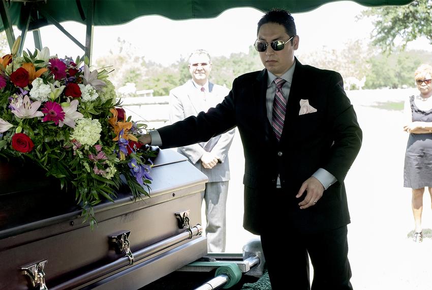 Chris Zavala mourns the loss of his wife, Michelle Zavala, during her funeral service at Cook-Walden/Capital Parks Funeral Home in Pflugerville on Aug. 5, 2017. Michelle died a week after giving birth to their daughter, Clara.