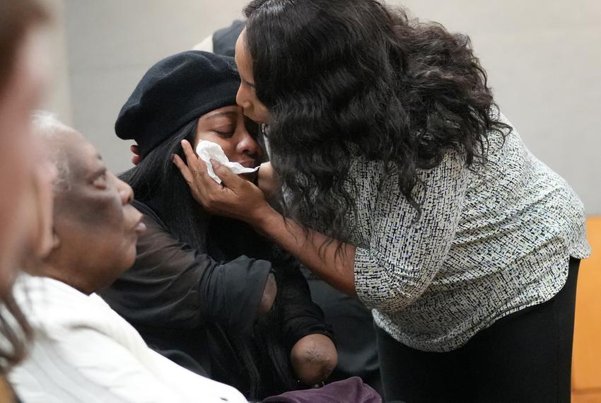 Whitney Mitchell is comforted by her mother, Patricia Kirven, after Daniel Perry was sentenced to 25 years for the murder of Mitchell's husband Garrett Foster, at the Blackwell-Thurman Criminal Justice Center on Wednesday, May 10, 2023.