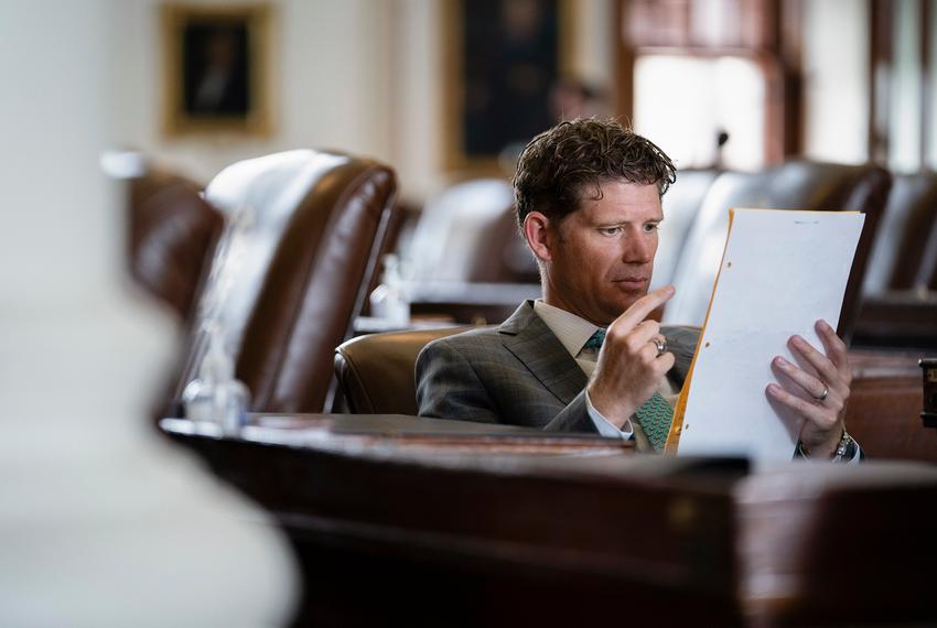 State Rep. Matt Krause, R-Fort Worth, reads proposed legislation while on the House floor on July 29, 2021.