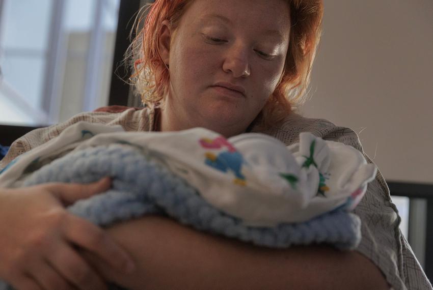 Miranda Michel cradles her twin sons Helios and Perseus Langley in her arms a day after delivery at Medical City Dallas in Dallas, TX on August 10, 2023. Unable to legally terminate the pregnancy in Texas despite the twins having lethal fetal anomalies and a zero percent chance of viability, Michel carried her twins to term.