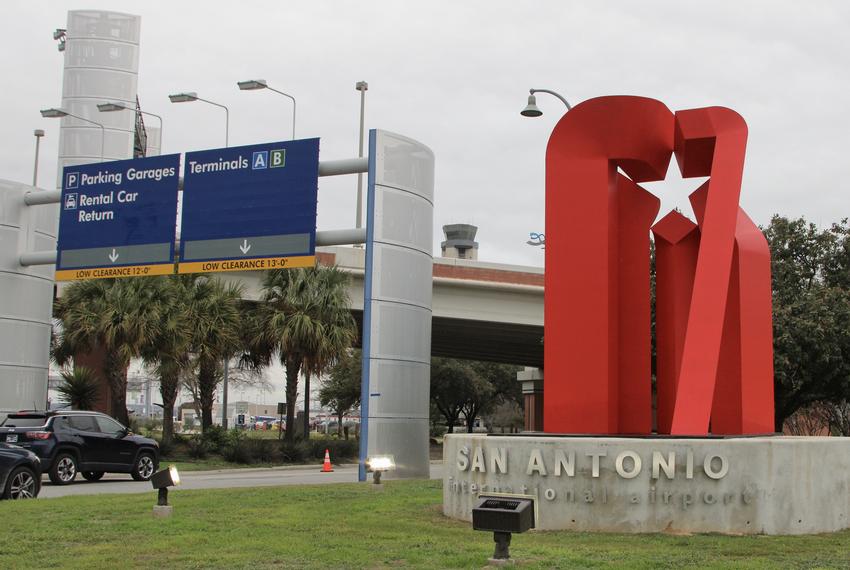 Exterior signage and sculpture at the San Antonio International Airport entrance way in San Antonio on Dec. 14, 2023.