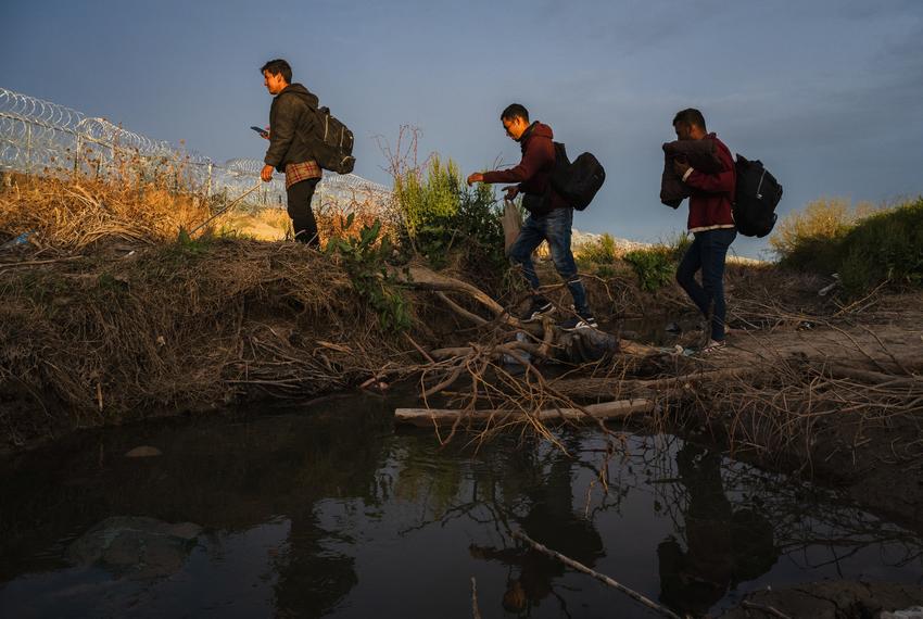 Migrants in Ciudad Juarez, Mexico cross the border from Mexico to the U.S. side of the Rio Grande, on March 20, 2024.