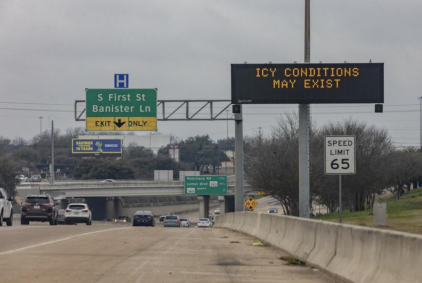 A road sign along Ben White Blvd. in South Austin warns motorists of icy conditions as unprecedented winter storm conditions grip the state of Texas on Feb 13, 2021.