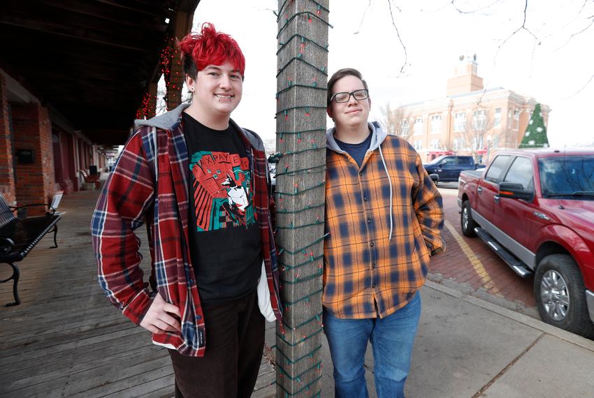 From left, Marcus Stovall and Bear Bright stand of the sidewalk across the street from the courthouse Saturday, Dec. 9, 2023 in Canyon, Tx.